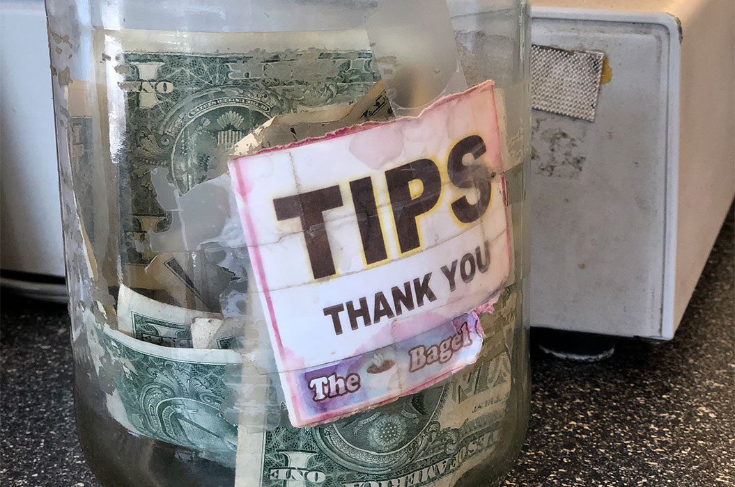 Food jar containing money for tips